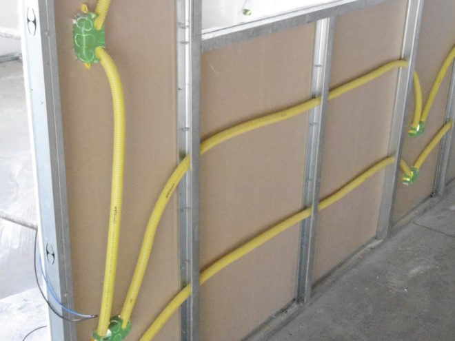 corrugated wiring inside the partition